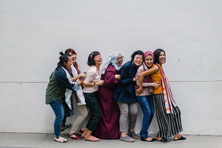 Women in Line Laughing